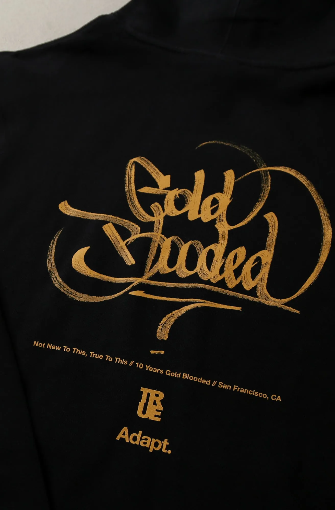 TRUE X Adapt :: Gold Blooded Truth (Men's Black/Gold Hoody)